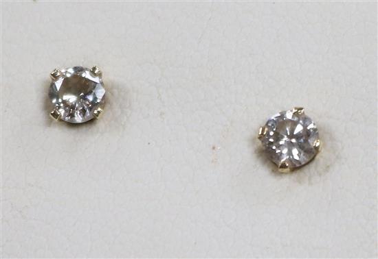 A pair of 14ct gold and solitaire diamond ear studs.
